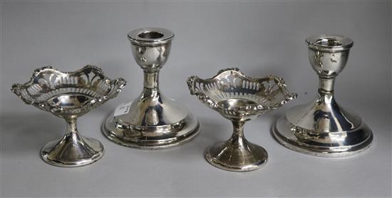 A pair of George V silver dwarf candlesticks, Birmingham 1936 and a pair of pedestal bon bon dishes, Birmingham 1937